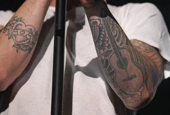 Adam Levine tattoo Guitar Tattoo