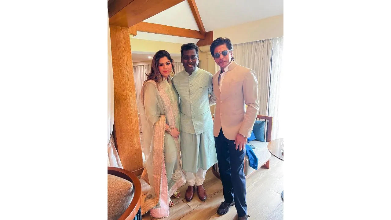 director Atlee flanked by Shah Rukh Khan and Pooja Dadlani at Nayanthara\'s wedding