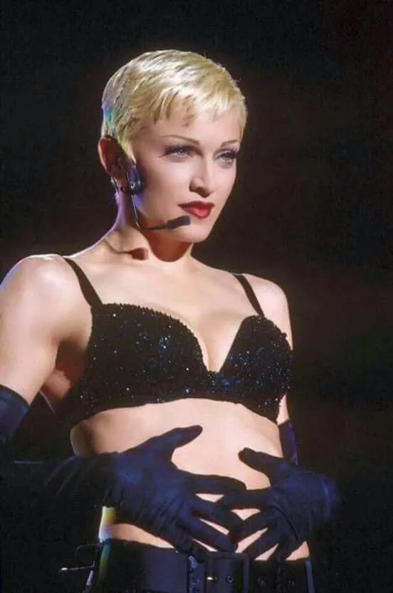 With A Blond Pixie Cut In 1993. 